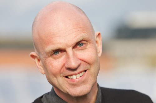 head shot of researcher smiling at camera